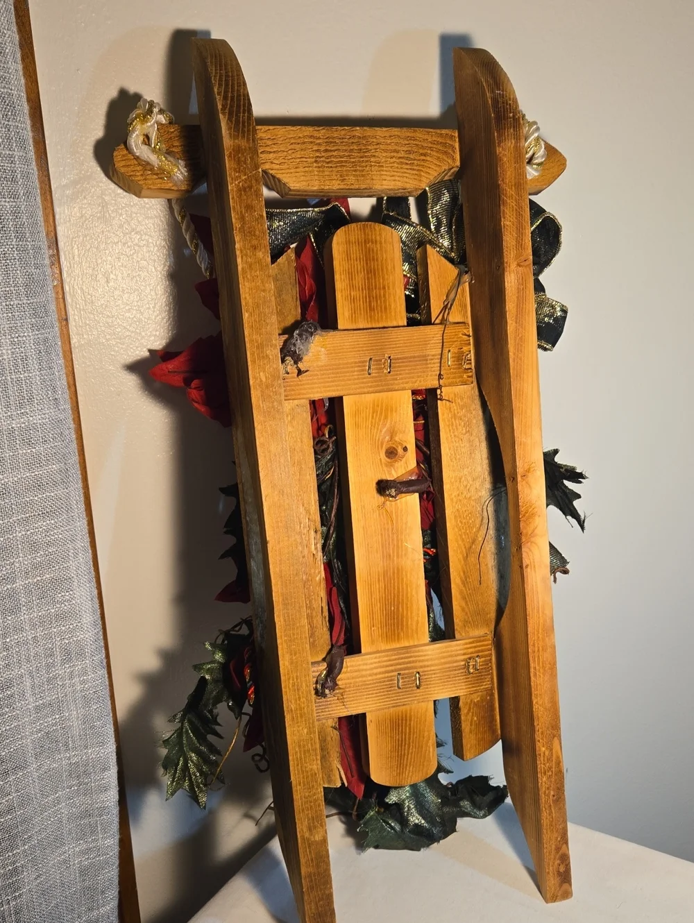 Holiday Poinsettia Sled Garland - Red